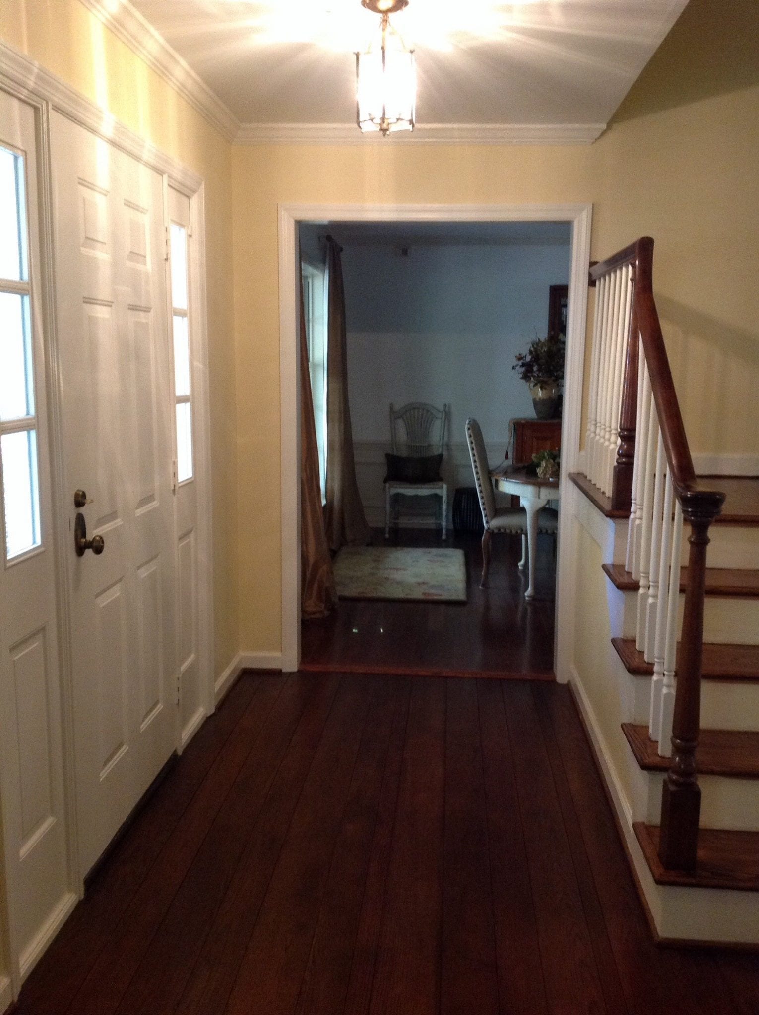 stairs on right with front door