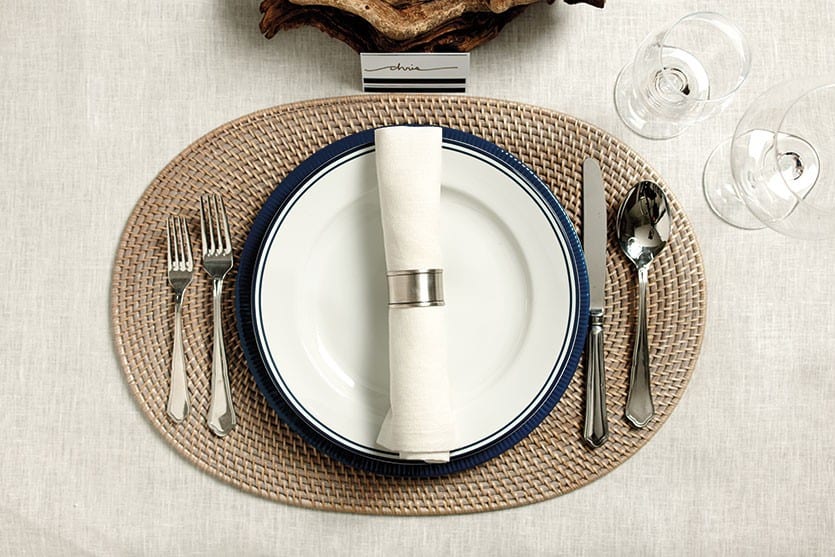 For a nautical look, we paired blue dinnerware with driftwood centerpiece