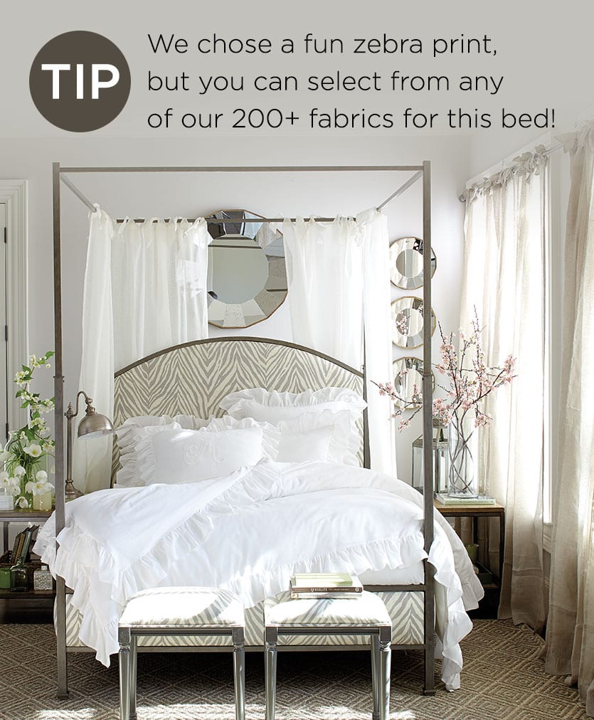 Gray bedroom with zebra print canopy bed