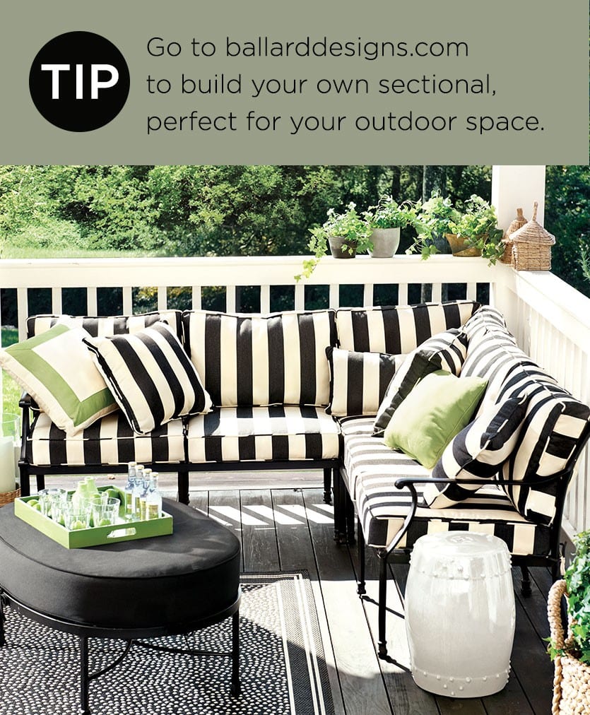 Outdoor porch with furniture in a black and white cabana stripe