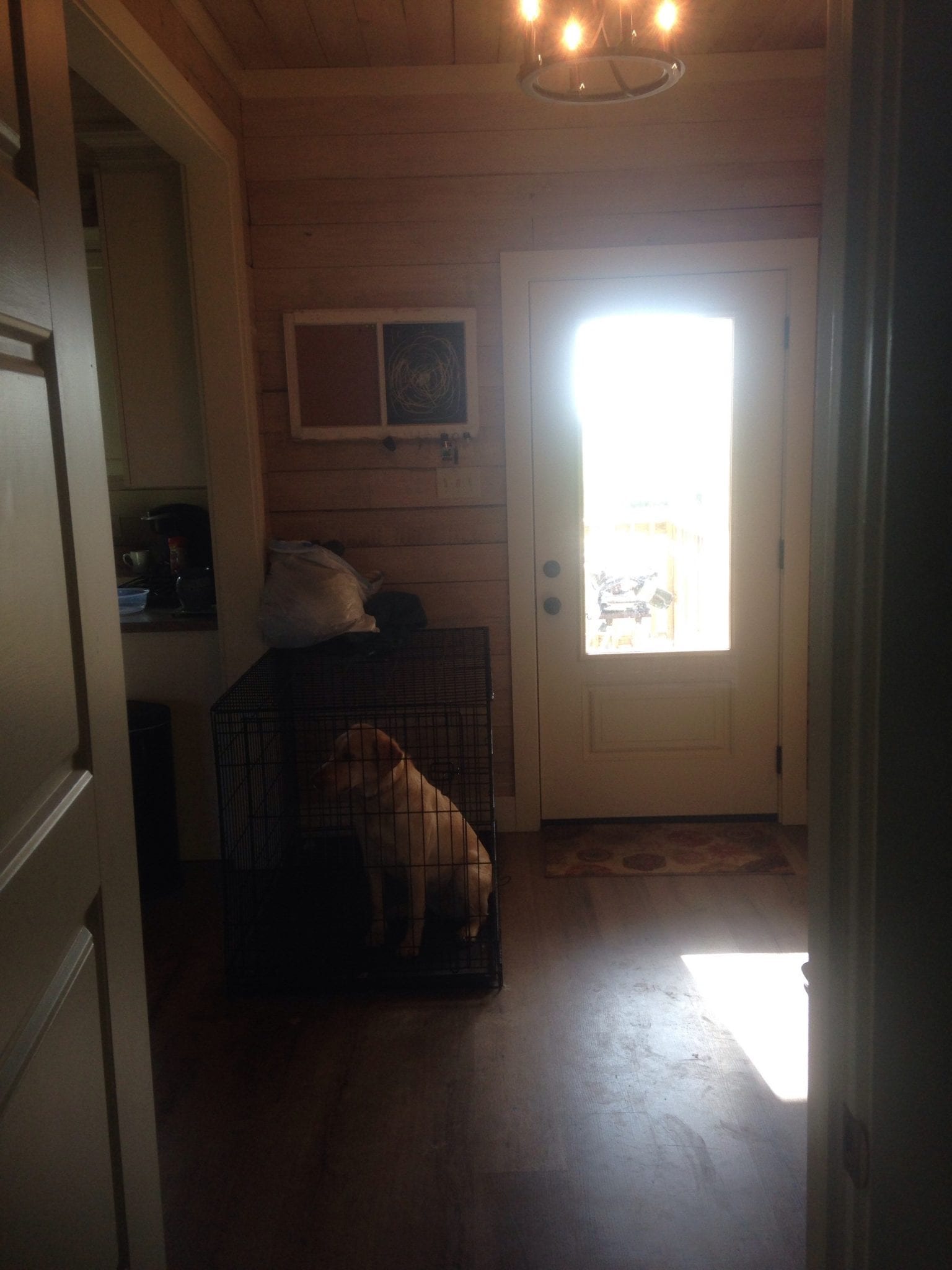 view through doorway to back room