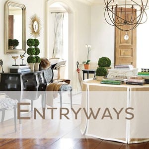 Entryway with round table and chandelier