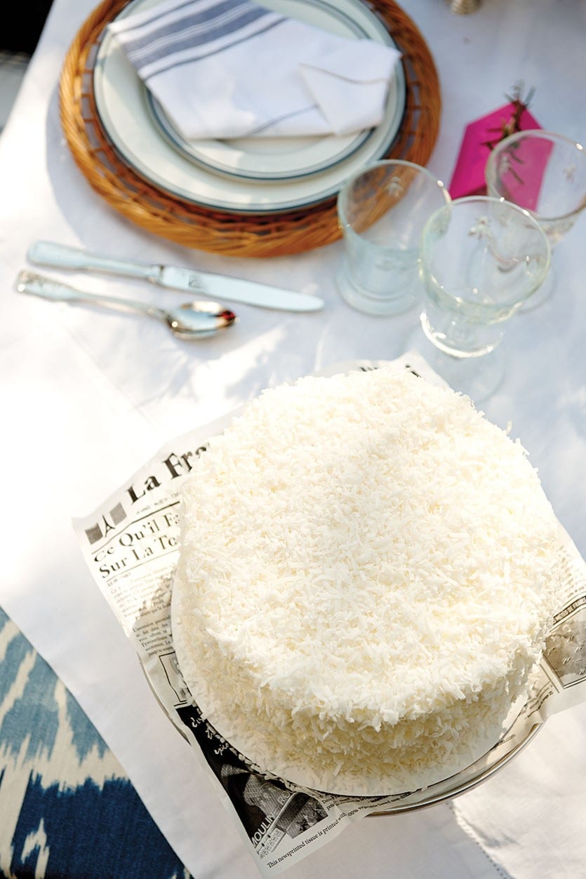 A pristine white coconut cake is the pièce de resistance in this table setting!