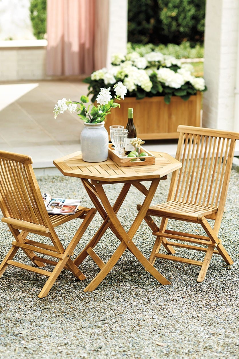 Suzanne Kasler's teak outdoor furniture collection for Ballard Designs