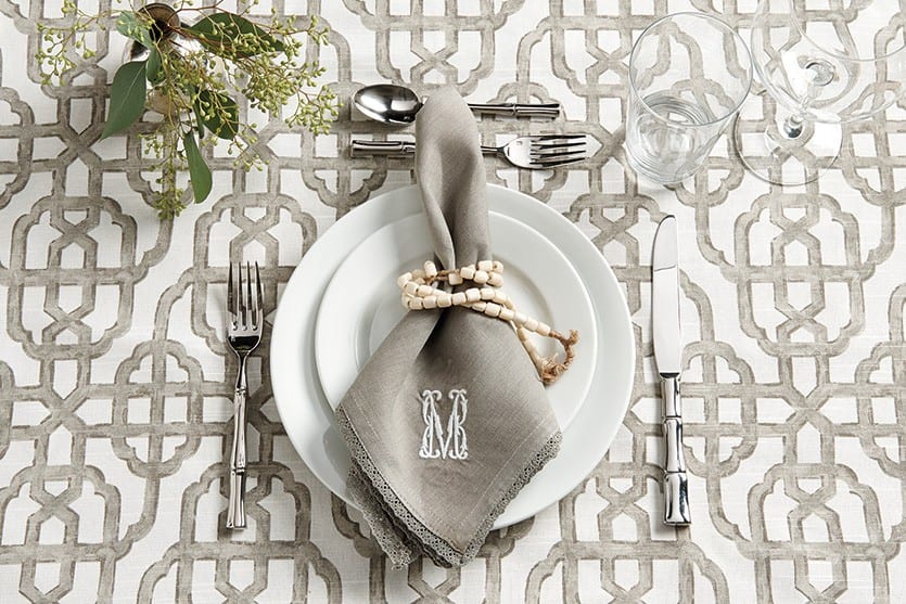 Trellis print fabric with gray linens