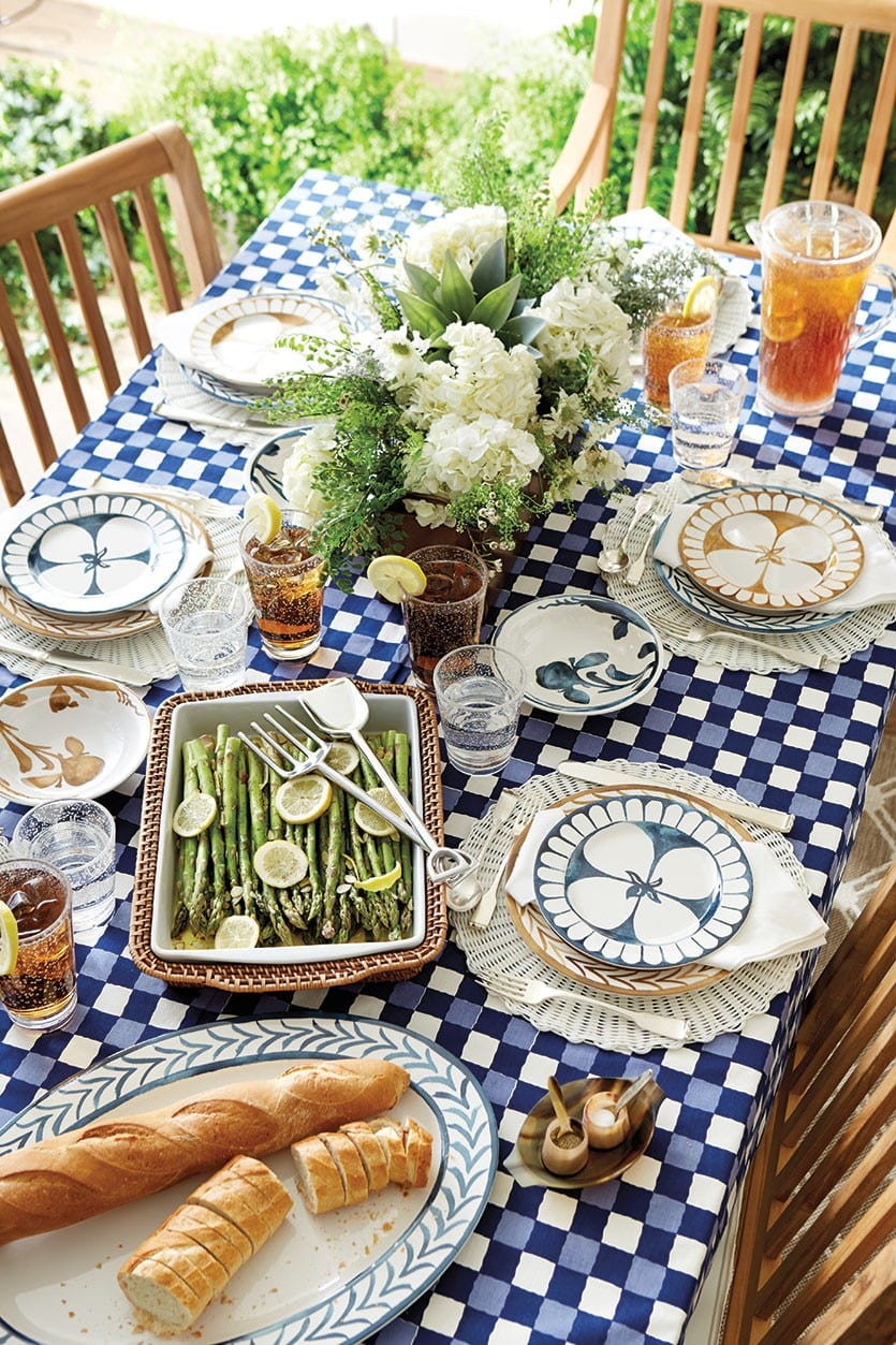 Blue and white check table cloth with blue plates