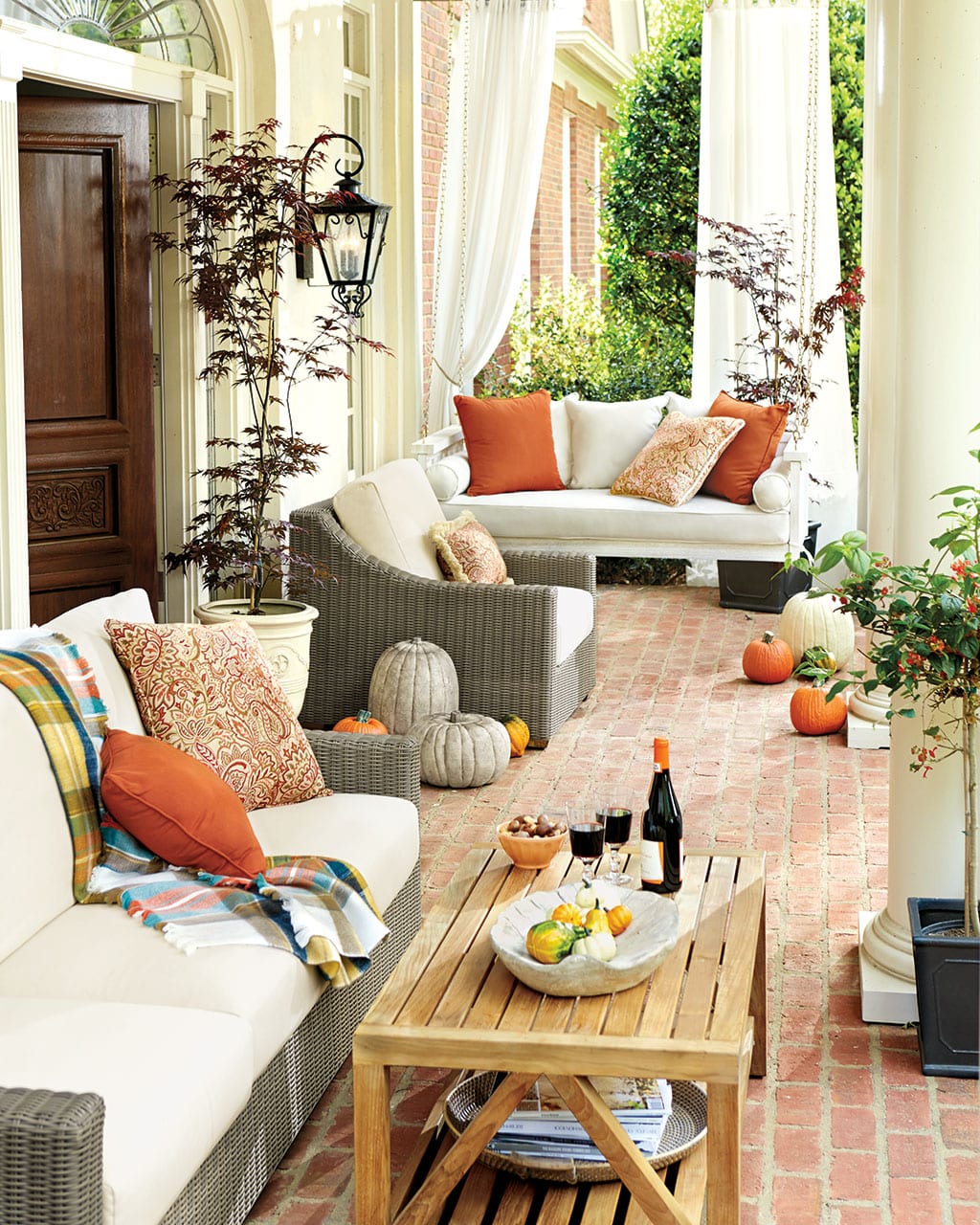 Spicey oranges create a cozy, inviting front porch