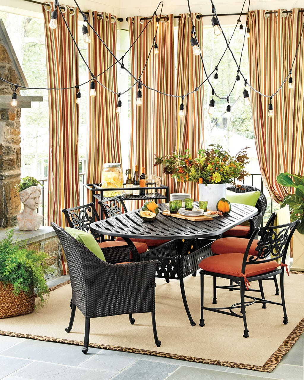 Warm oranges give this outdoor space a warm feel for Fall