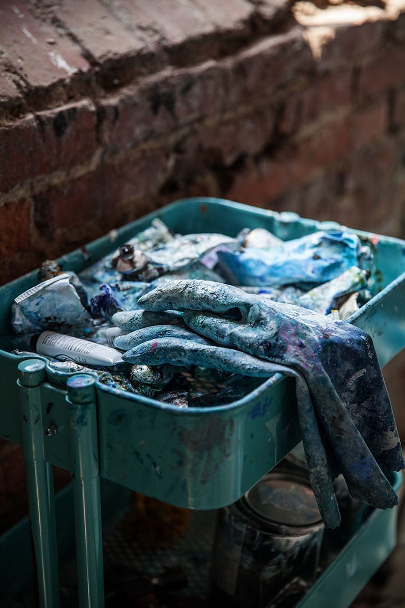 Old paint rags in a bucket in Kiki Fitzgerald's Atlanta studio