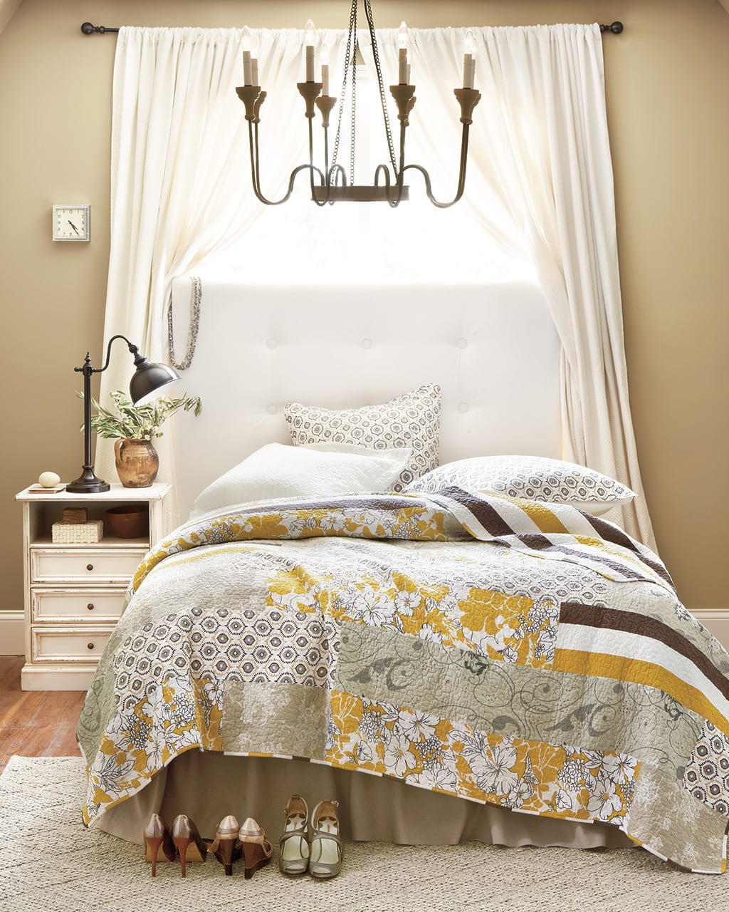 Use drapery panels to give your bedroom that cozy, canopy feel