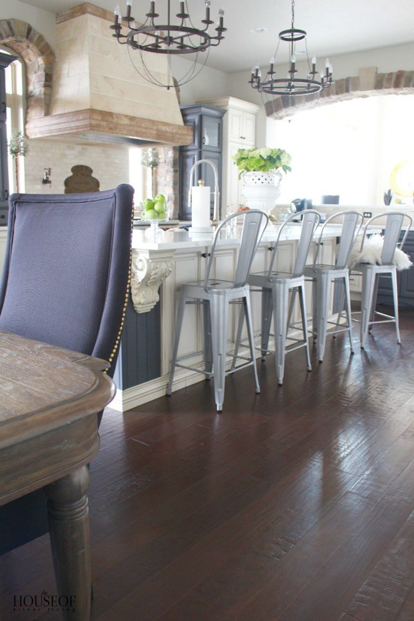 A Colorado kitchen by The House of Silver Lining I chandeliers by Ballard Designs