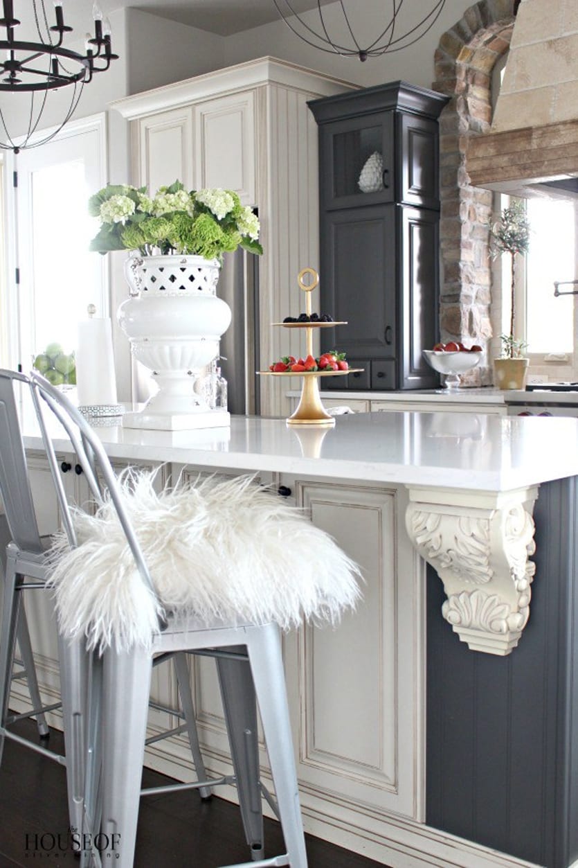 A Colorado kitchen by The House of Silver Lining I chandeliers by Ballard Designs