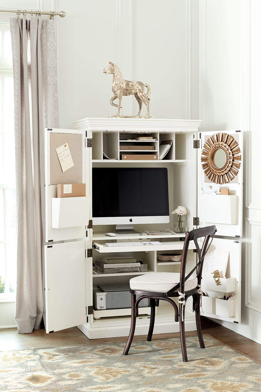 Ballard Designs Audrey Workstation has built in bulletin boards, adjustable cubbies, printer pull out tray, and nailhead detail