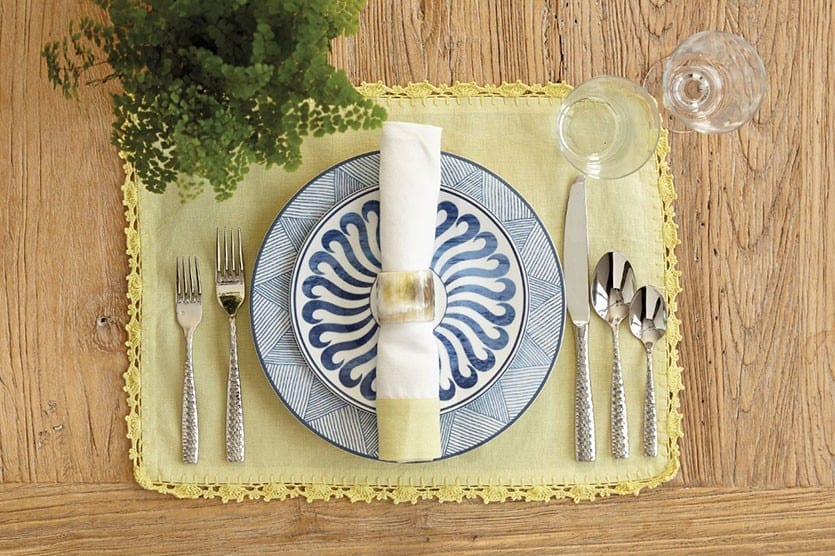 We like to think of navy blue as a neutral since it pairs so beautifully with so many colors, like citron table linens. This pretty color palette create a stunning table, appropriate for Spring and summer entertaining.