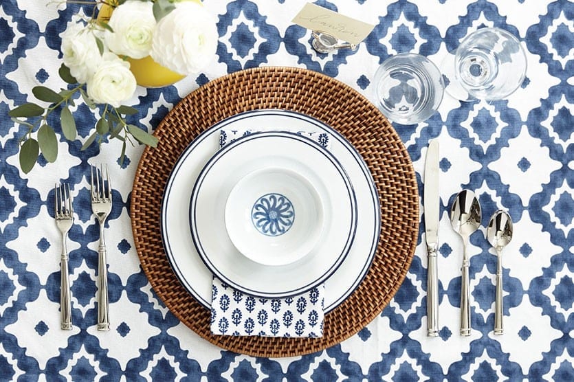 Easy way to bring bold impact to your table? A patterned tablecloth! Our Perdido tablecloth works perfectly with Bunny Williams' Campbell House dinnerware and woven chargers.