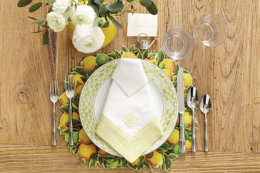 We love this color palette for warm weather. Bunny Williams' Melange dinnerware looks perfect with out citrus placemats.