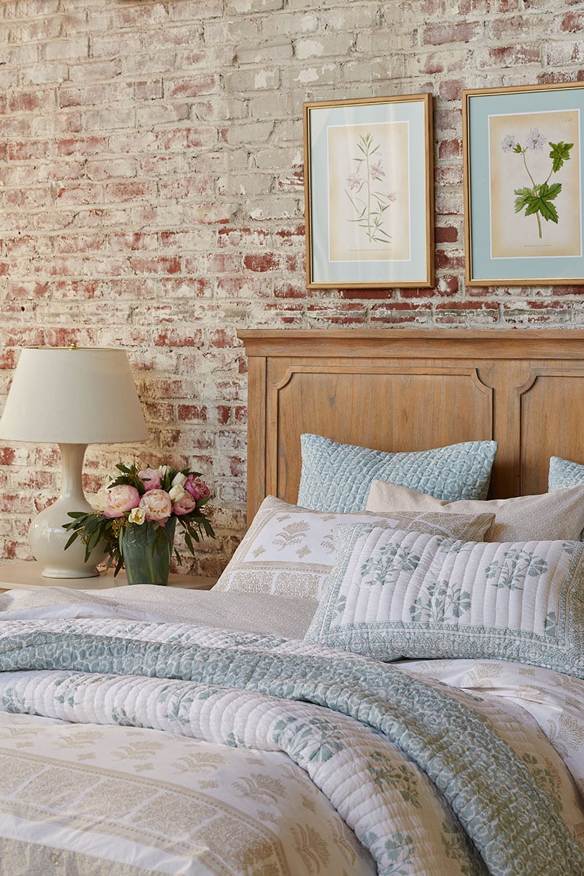 Bedroom with soft color palettes and toile bedding