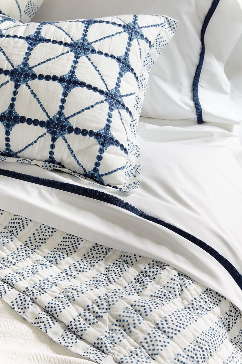 Japanese dying technique of shibori looks like tie die -- we love it on our Milos Bedding