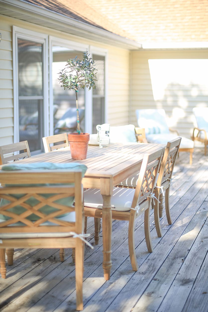 Blogger Julie Blanner's lake house deck with Ballard Designs Ceylon Teak Outdoor Furniture