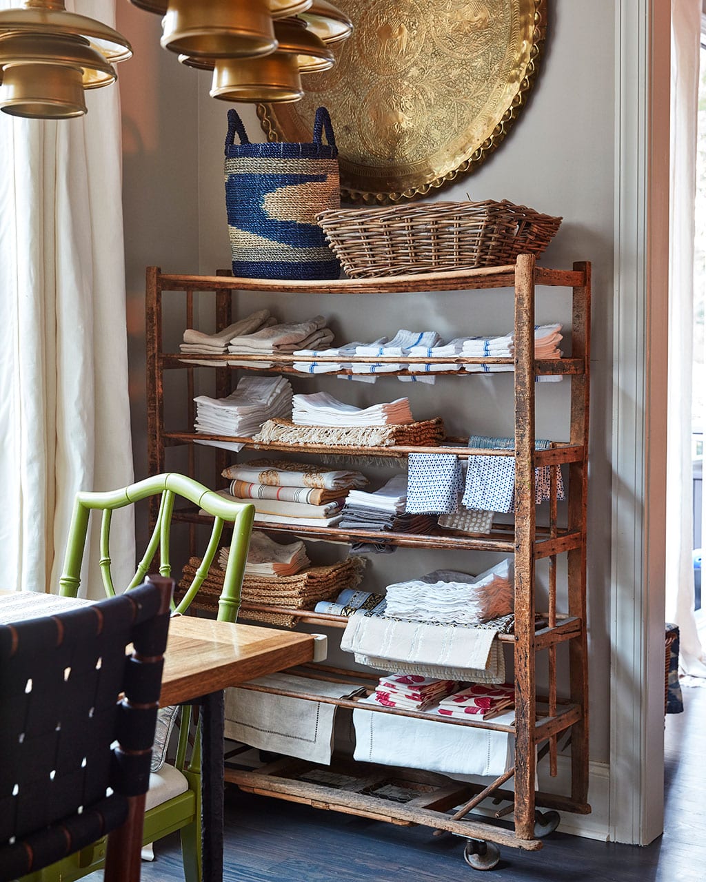 An antique shoe rack that Natalie uses for linen storage