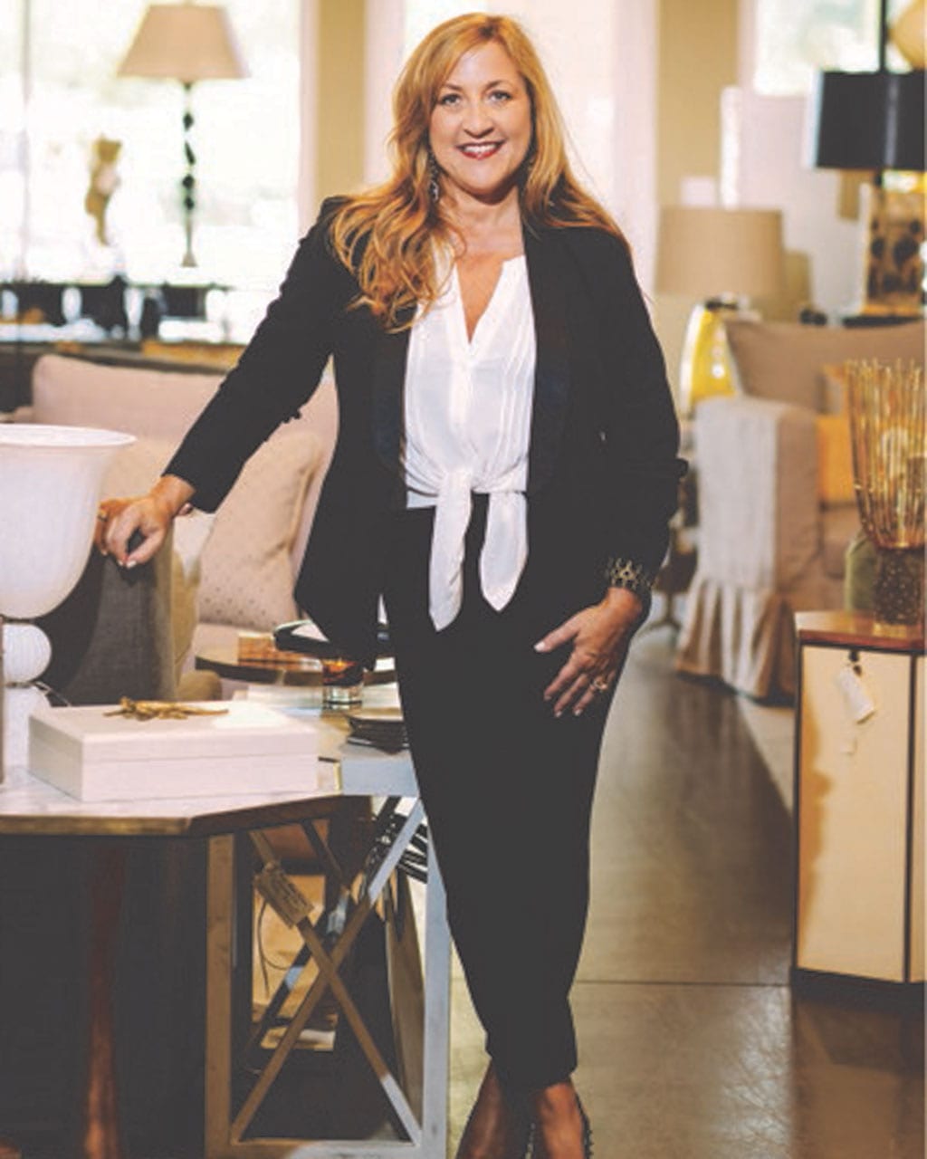 Interior designer Cindy Meador poses in her store