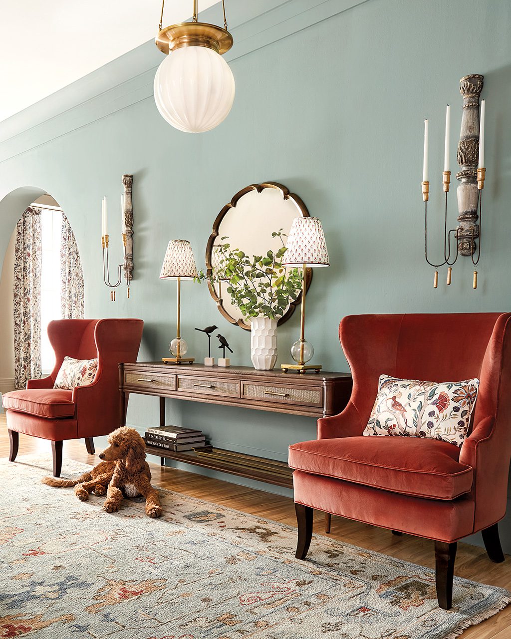 A console with a pair of chairs creates symmetry and a focal point