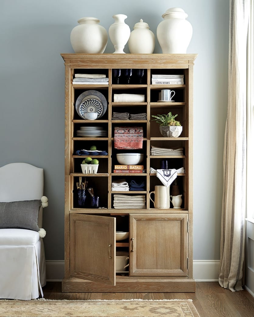 Ballard Designs Beckett Cabinet has adjustable shelves to make storage pretty and efficient