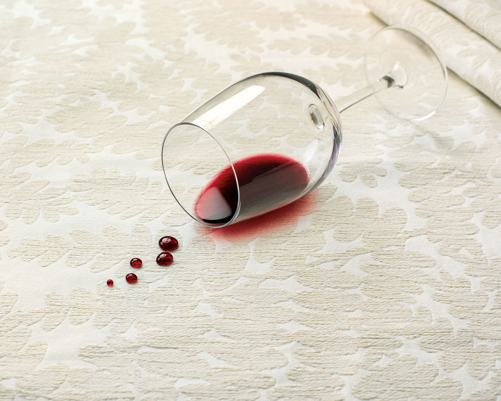 InsideOut patterned performance fabric with a wine stain