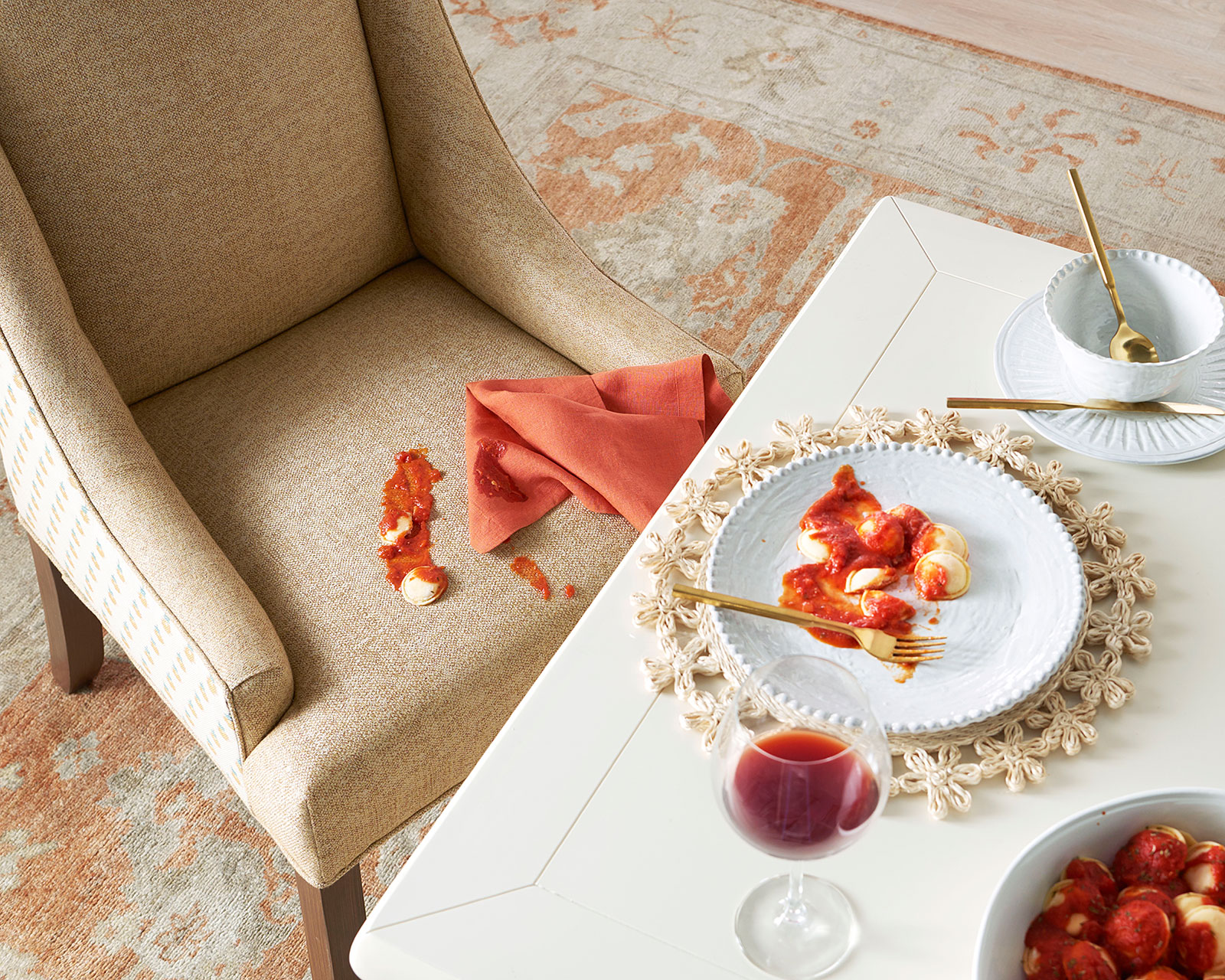 Sunbrella performance fabric on a dining chair with pasta spilled