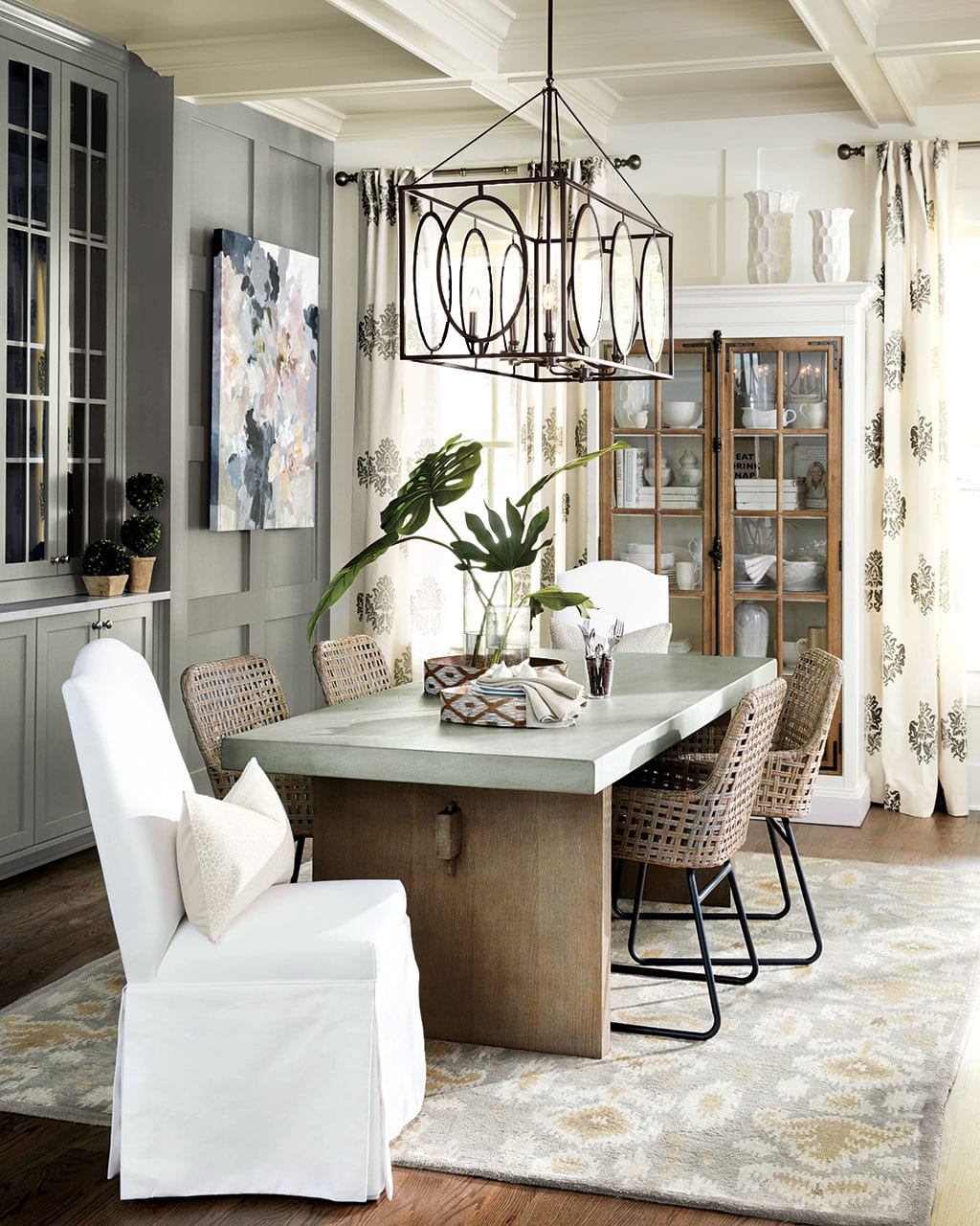 Dining room with white accents and bronze metal