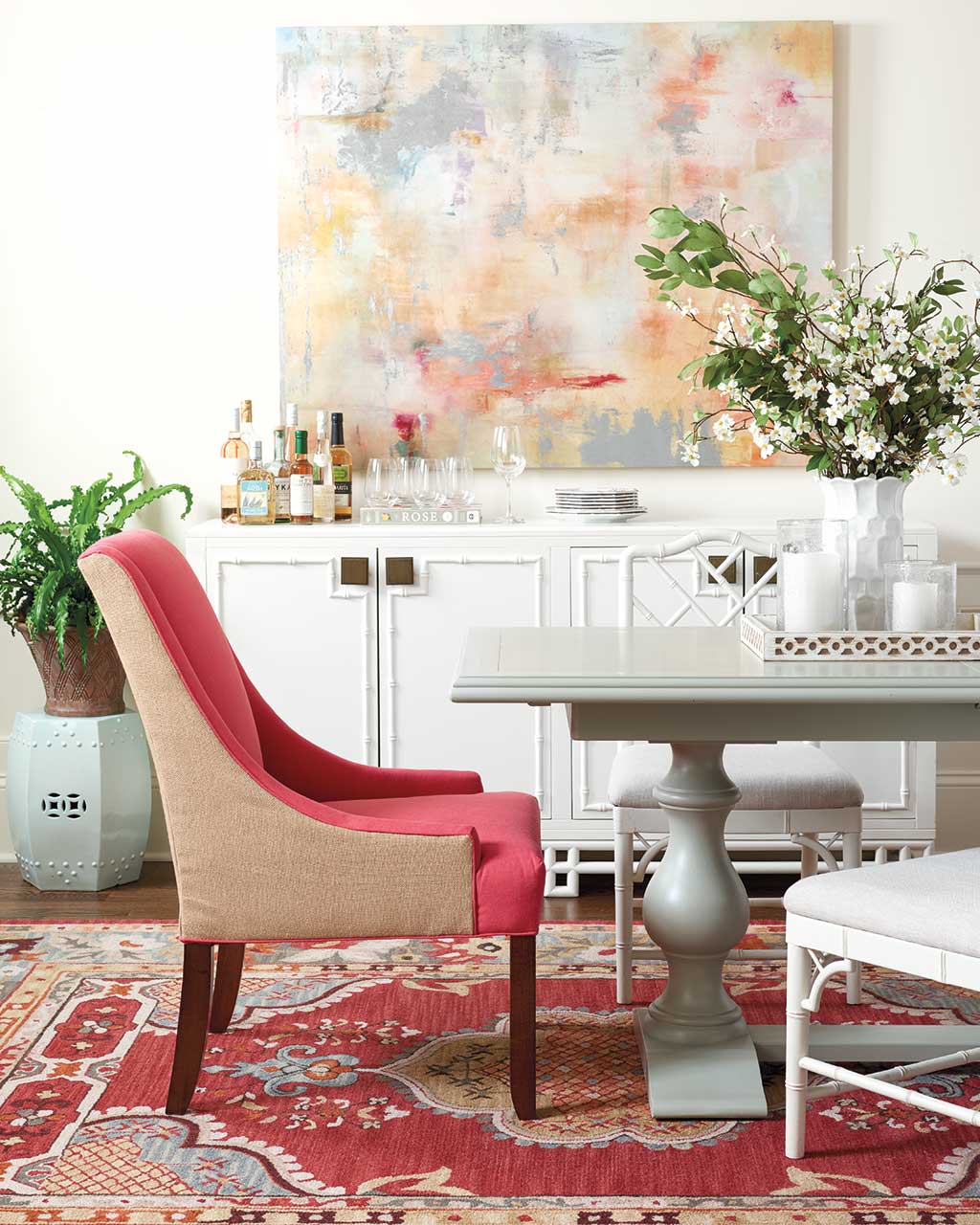 A patterned rug hides stains in a dining room