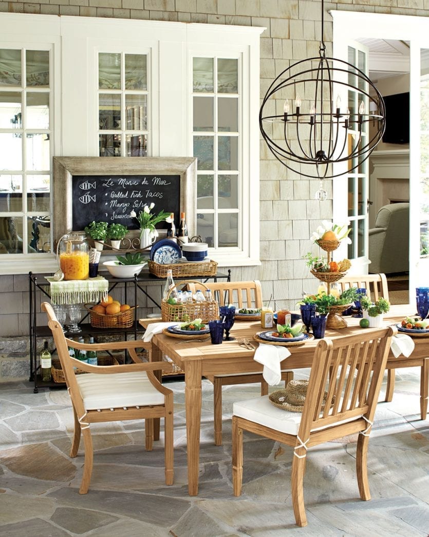 Teak dining table on a patio and porch | Ballard Designs