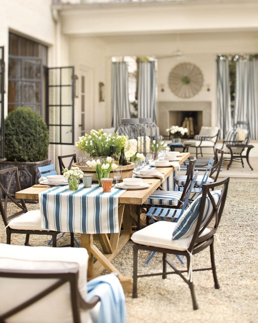 Long outdoor dining table in Suzanne Kasler's backyard | Ballard Designs