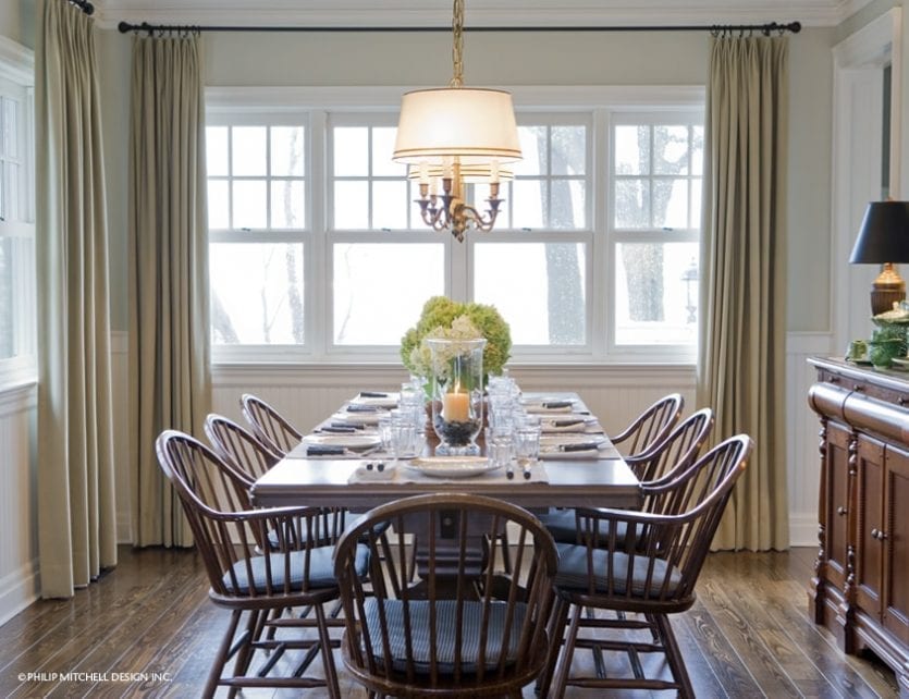 Dining room designed by Philip Mitchell with Windsor chairs and wood table