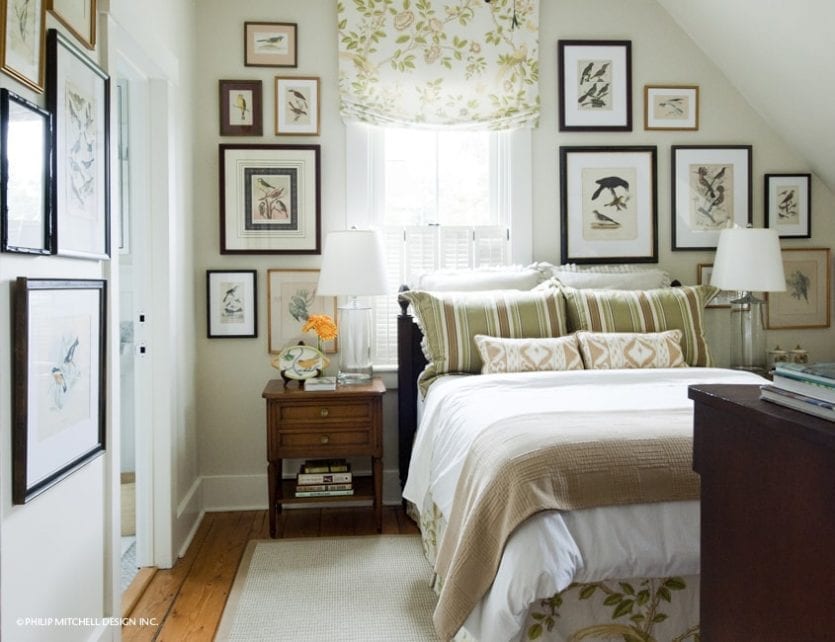 Bedroom designed by Philip Mitchell with tan and khaki and a gallery wall