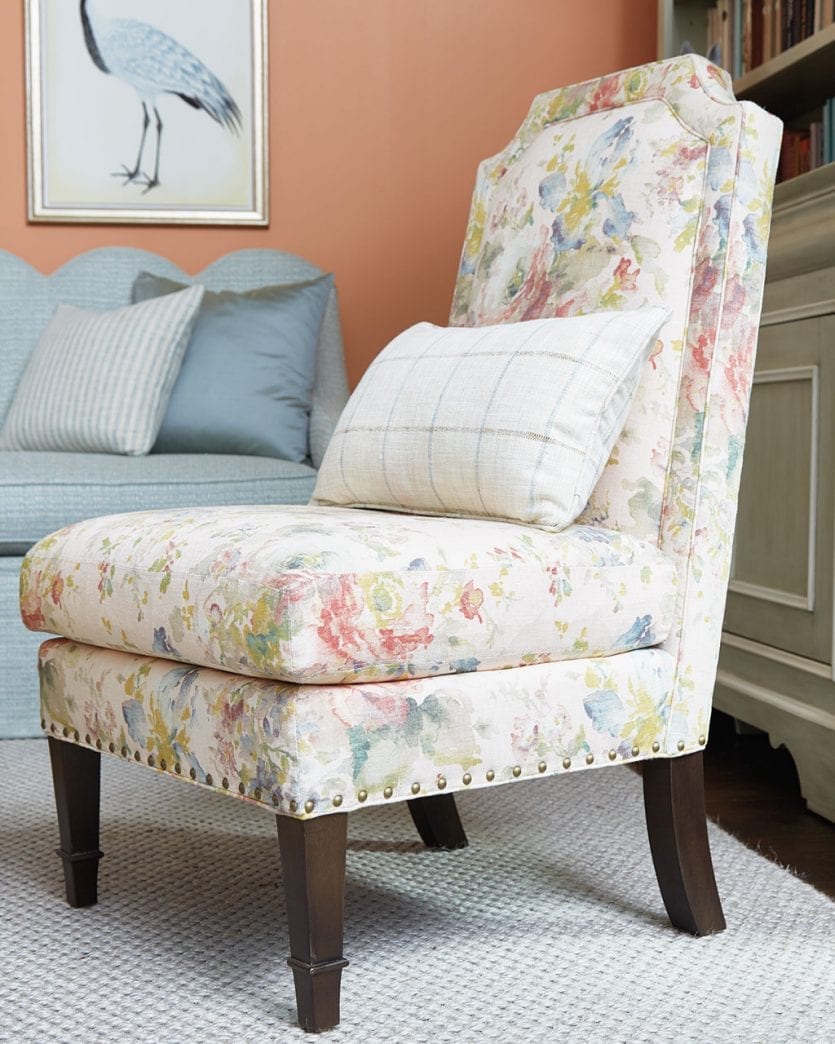 Slipper chair in pink floral fabric designed by Bunny Williams for Ballard Designs