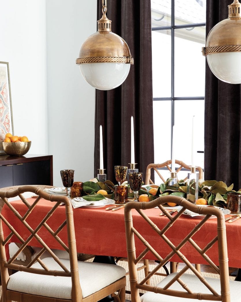 Layer linens and accents to create a warm, Thanksgiving table setting