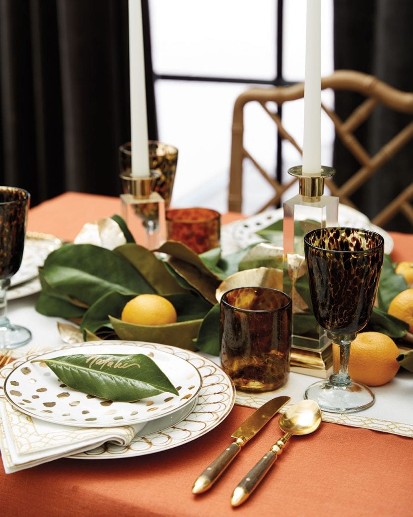 Layer linens and accents to create a warm, Thanksgiving table setting