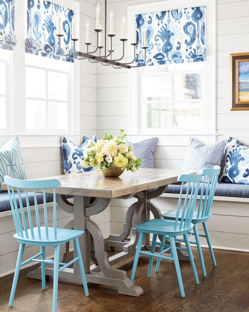 Blue and white breakfast room with great room designed by Whitney Durham