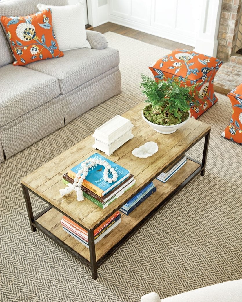 Wood coffee table in family great room designed by Whitney Durham