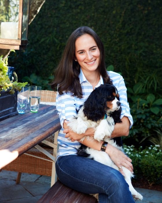 Charleston designer Olivia Brock with her Cavalier King Charles Spaniel