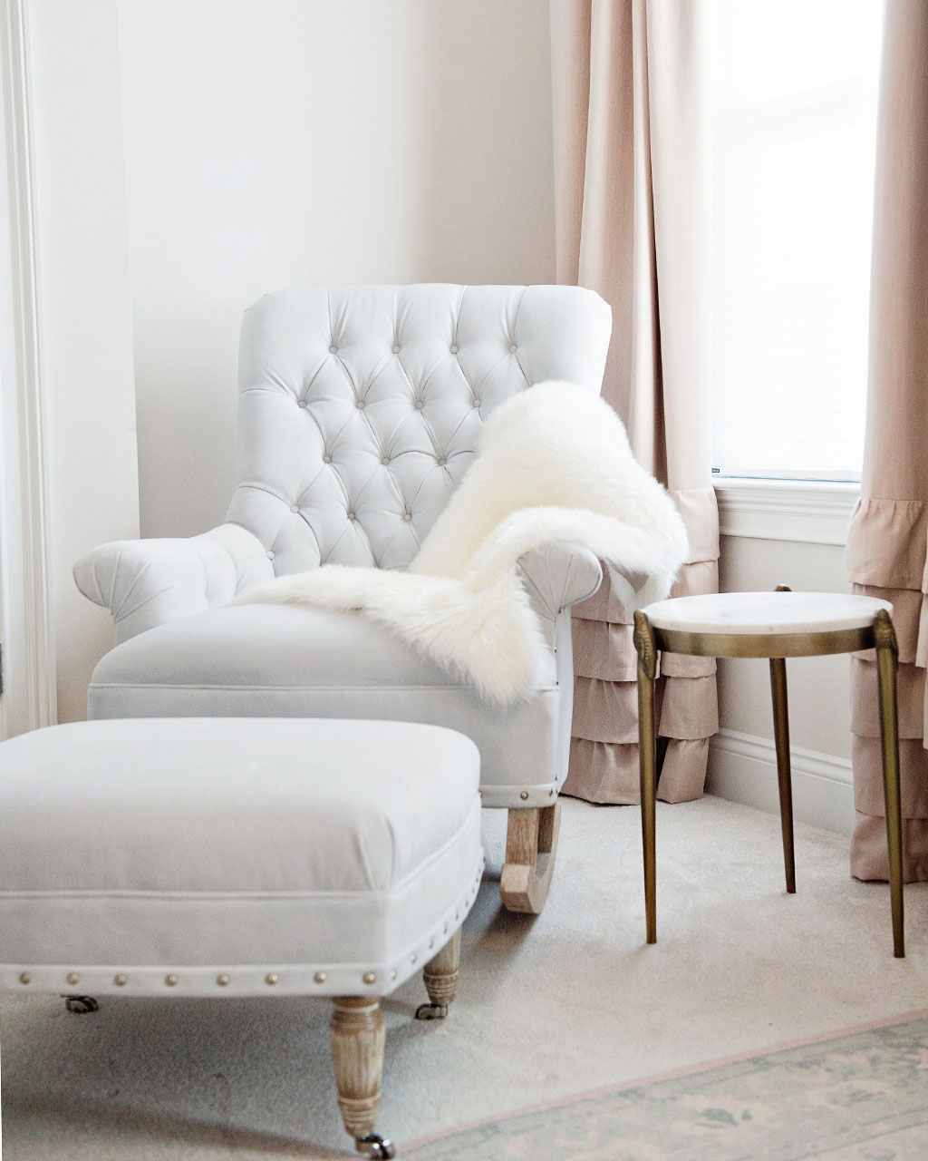 Chair in pink nursery design by Kimberly Barr