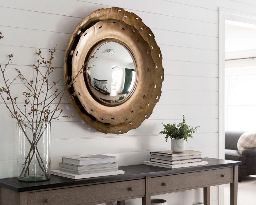 Entry table with large mirror and simple branches