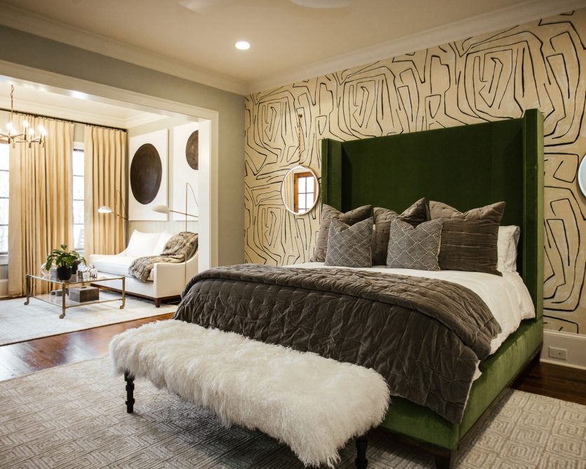 Master bedroom with emerald green velvet bed and Kelly Wearstler wallpaper designed by Jade Joyner