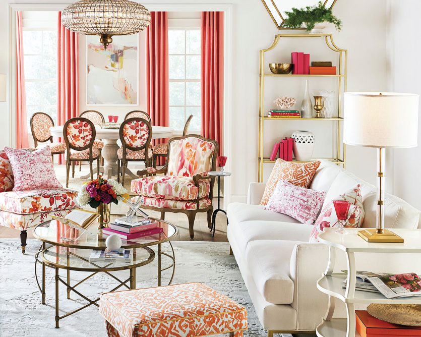 Pink and orange living room with a mix of styles from Ballard Designs