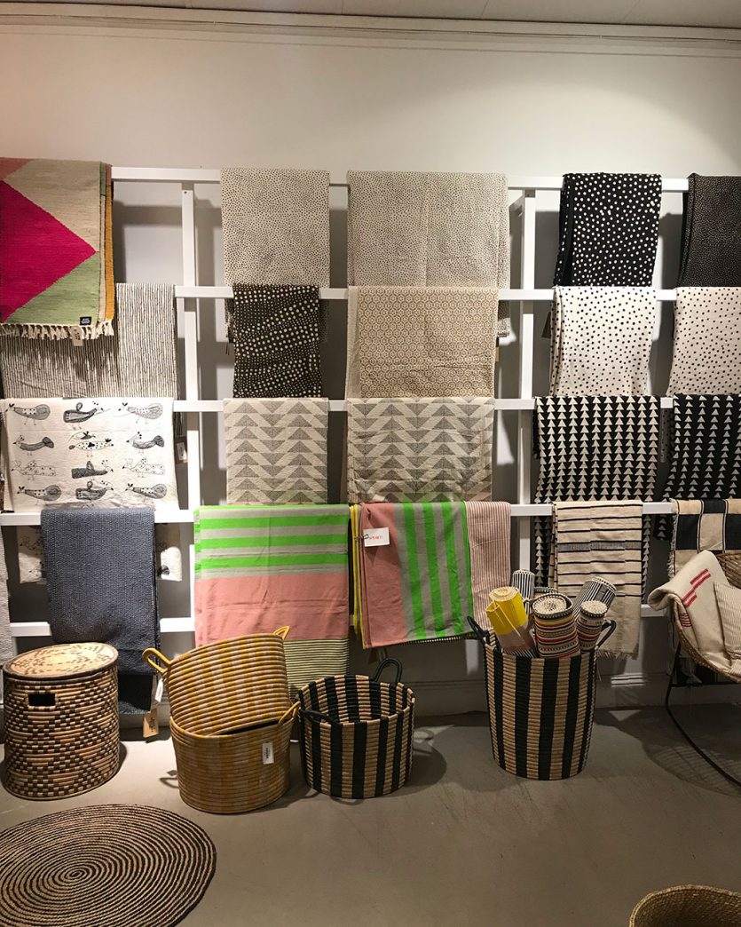 Throw blankets and baskets in shop on one of Skye's recent trips