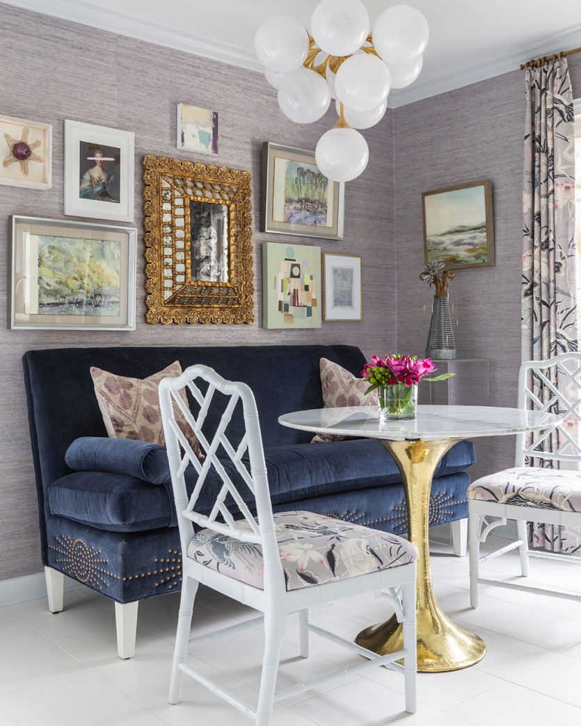 Breakfast room with velvet banquette and tulip table designed by Rachel Cannon