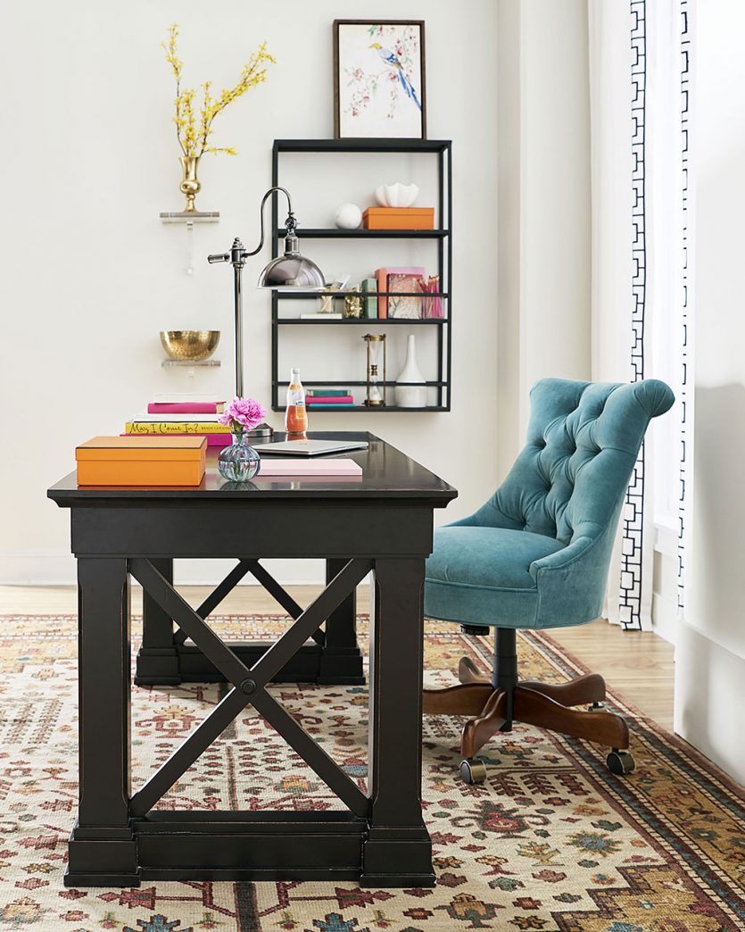 Teal velvet desk chair in bright home office