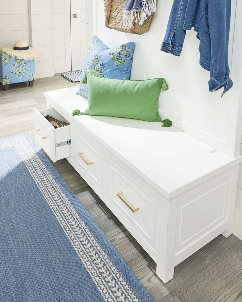 Entry bench with hooks and hidden drawers designed by Ballard Designs