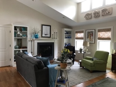 Living room for adjacent dining room with vaulted ceiling